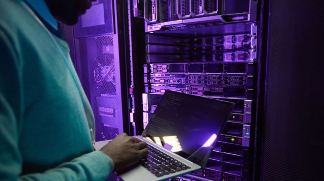 Man typing at a server