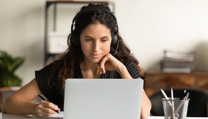 Woman looking at a laptop