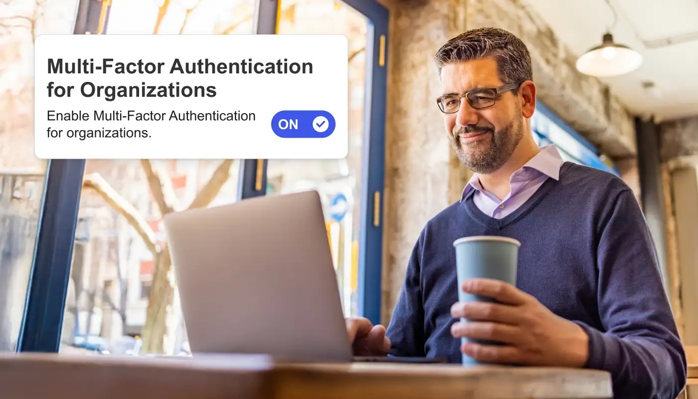 Person on a laptop with a coffee cup with multi-factor authentication setting superimposed above