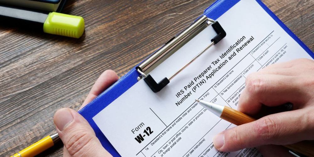 Close up of IRS document W-12 for renewing your PTIN